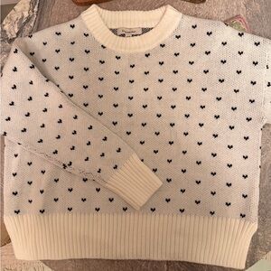 Francesca’s white sweater hearts